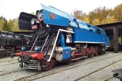 038477
